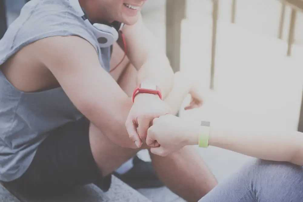 People Bumping Fists fitness centers in phoenix